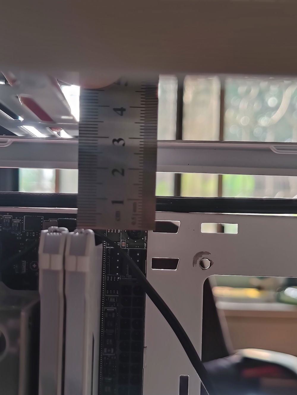 I estimated that I had around 34mm of clearance from RAM edge to the top bottom of the panel, which meant nothing else but an ultra slim radiator would work. 

My choices were a 17mm chinese radiator I was unfamiliar with, or the 20.5mm thick XSPC TX240 radiator. I went with the tried and true, which necessitated the slimmest fans I could find - the 12mm Scythe Kaze Slim 120mm fans.

The two would add up to 32.5mm of thickness out of the 34mm of clearance that I theoretically had.