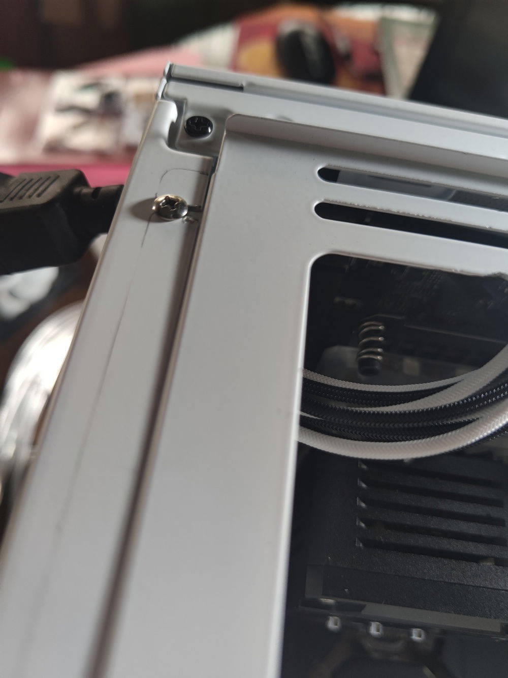 Tapping the screw holes made for a secure mount for the top radiator.