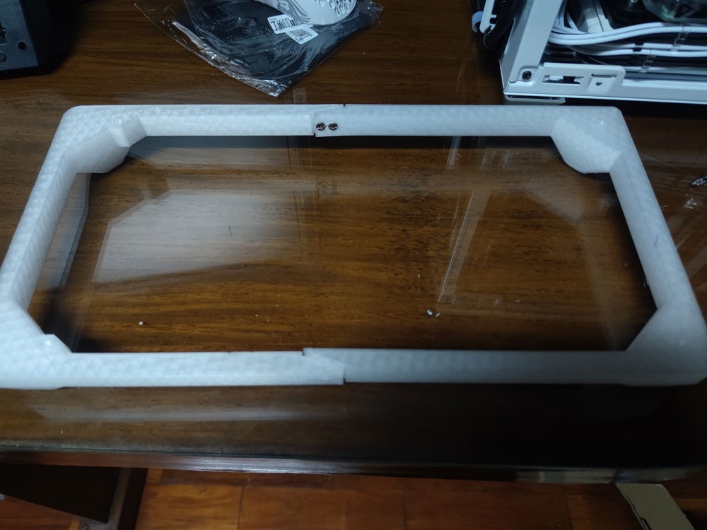 Two screws on each side joined the two pieces together.