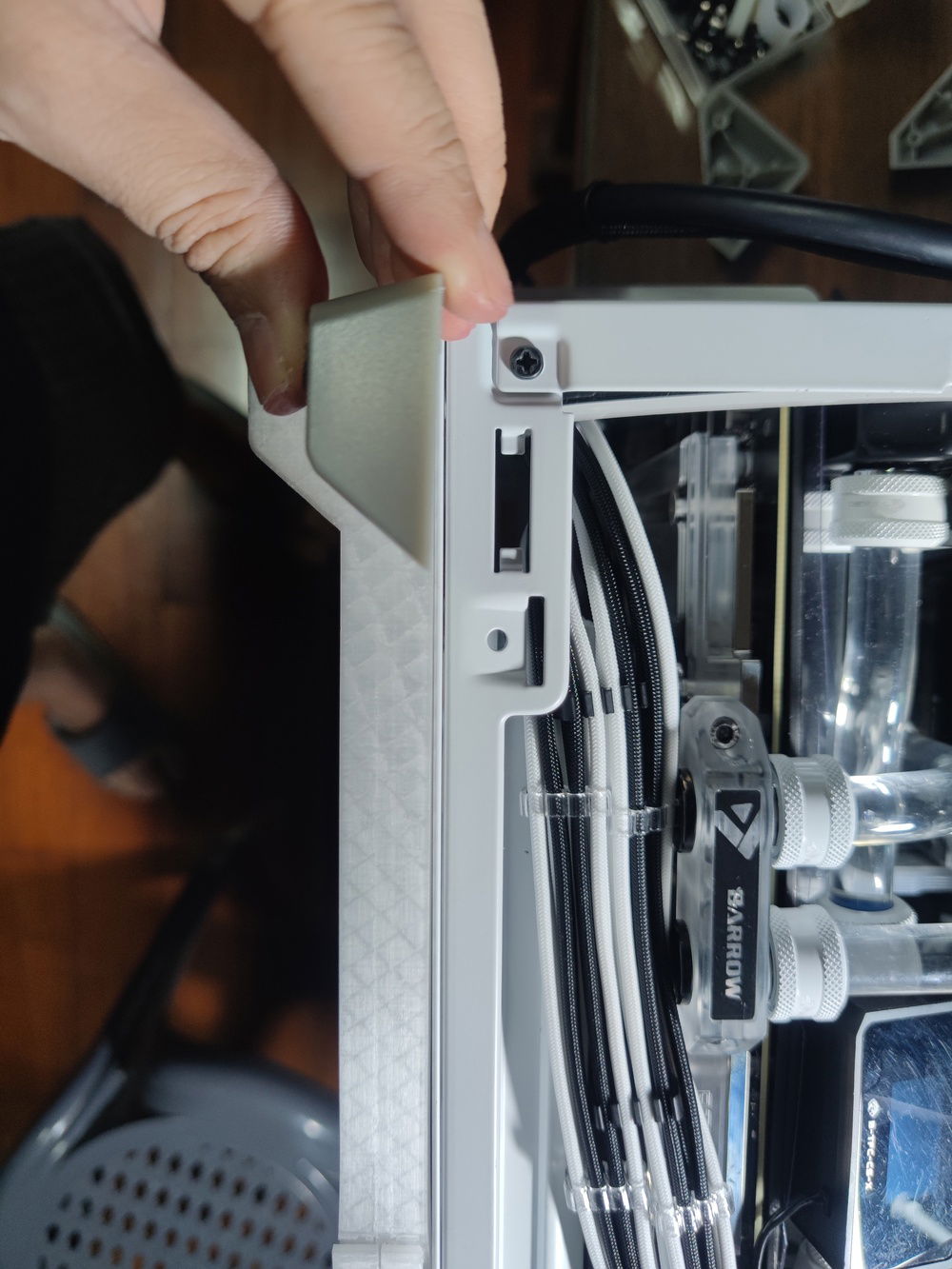 Here is a comparison of the default feet versus the installed riser. Enough space for ventilation and keeps the look of the whole case clean.