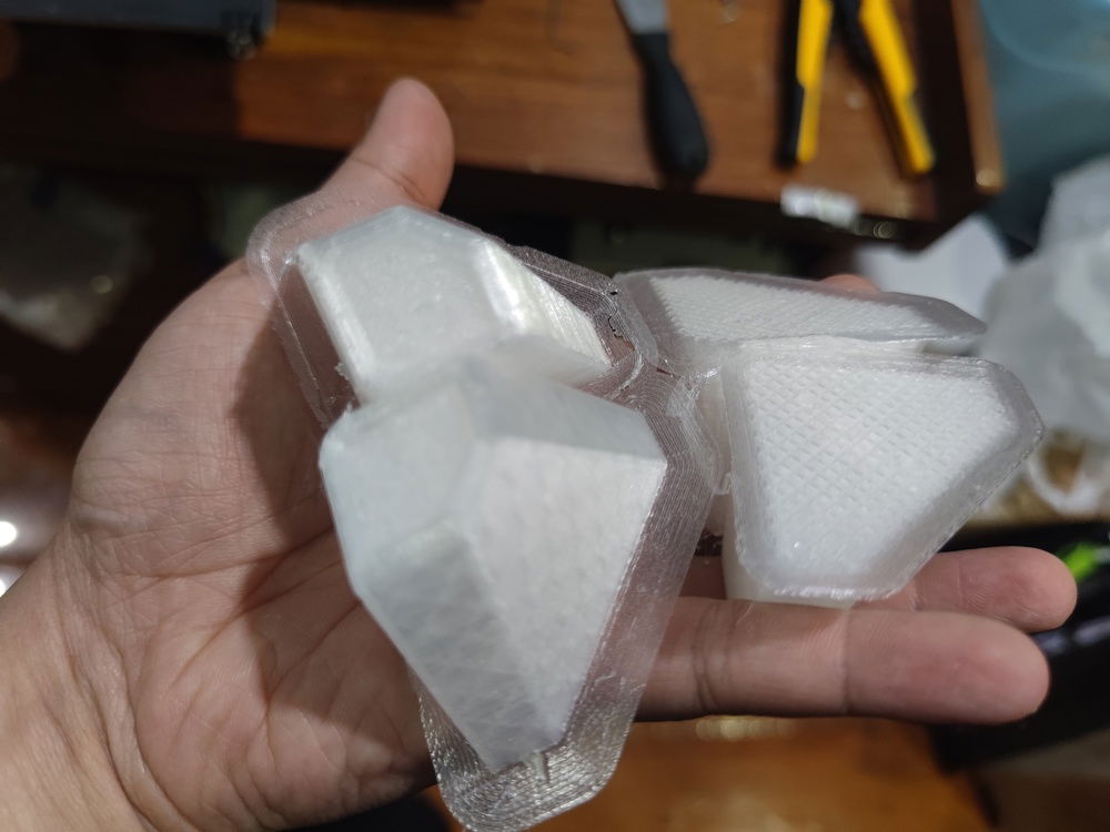 I experimented with three different feet for the NR200 - one was available from the Cooler Master website - which I rejected as it was not any higher than the standard, and this second version was certainly taller.