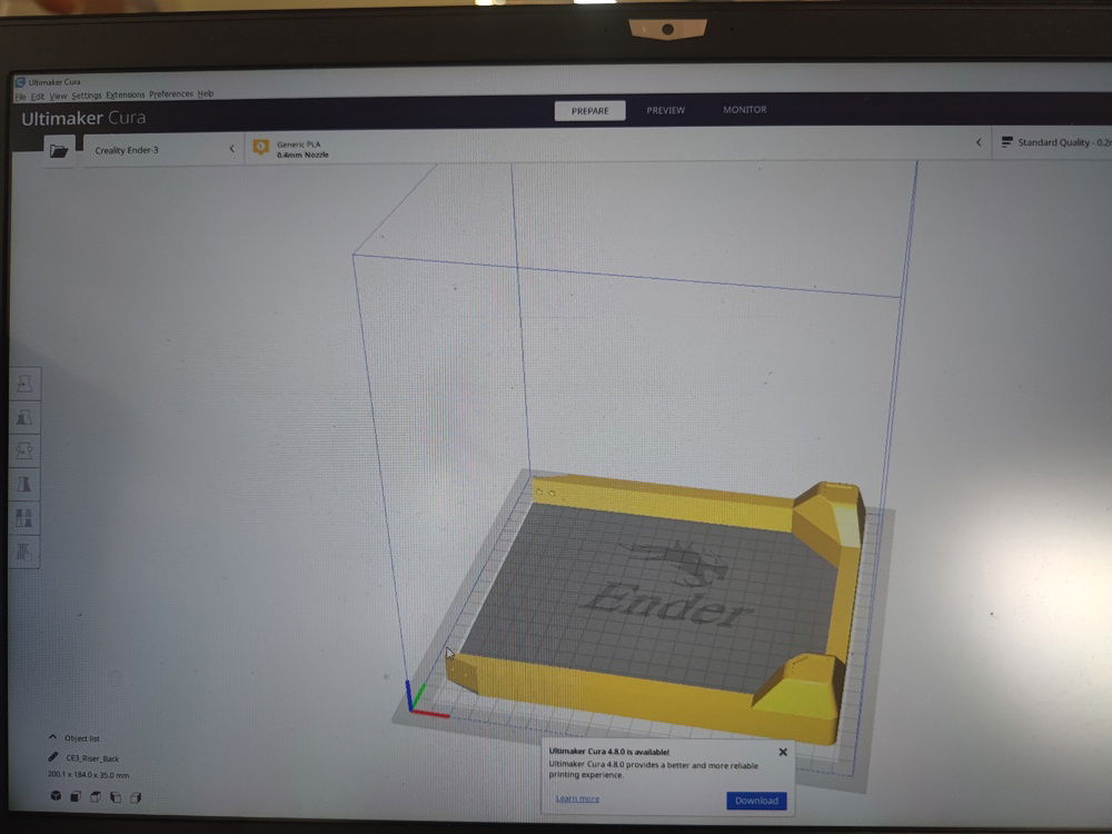 A generous soul shared his self-made stl files for a riser-style feet/shroud design for the the NR200, here seen in my slicer software.