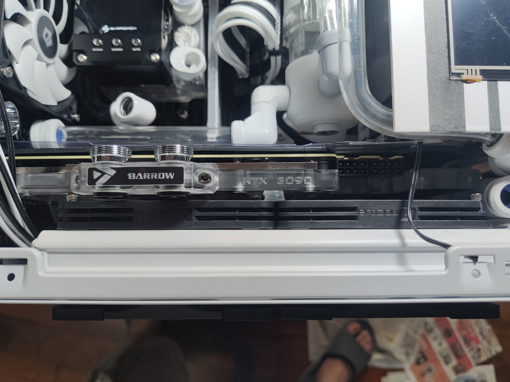 The Noctua NF-A12x15 Chromax fans gave around 3mm of clearance from fan blades to the bottom of my GPU block.