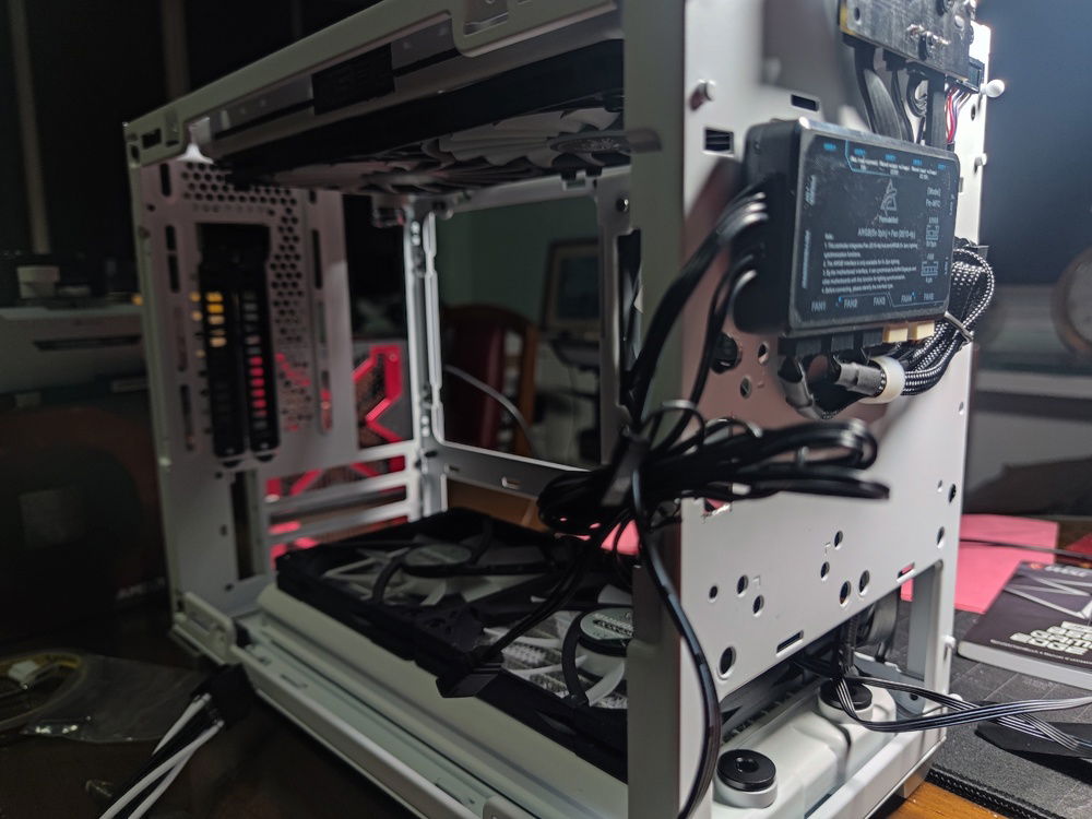 With space at a premium, most of the cables and paraphernalia ended up at the front of the case, hidden from view by the decorative metal front panel.