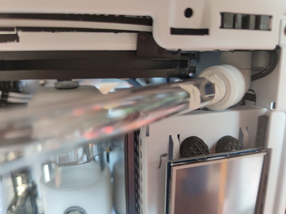 I bent my tubes by using longer than required tubes and connecting to the fittings when possible so I could envision where I needed the bends and where the fittings and tubes would meet up. 

In this case I determined that I would not be able to use fittings for the bends due to the proximity of the tempered glass panel. But also for aesthetic's sake.