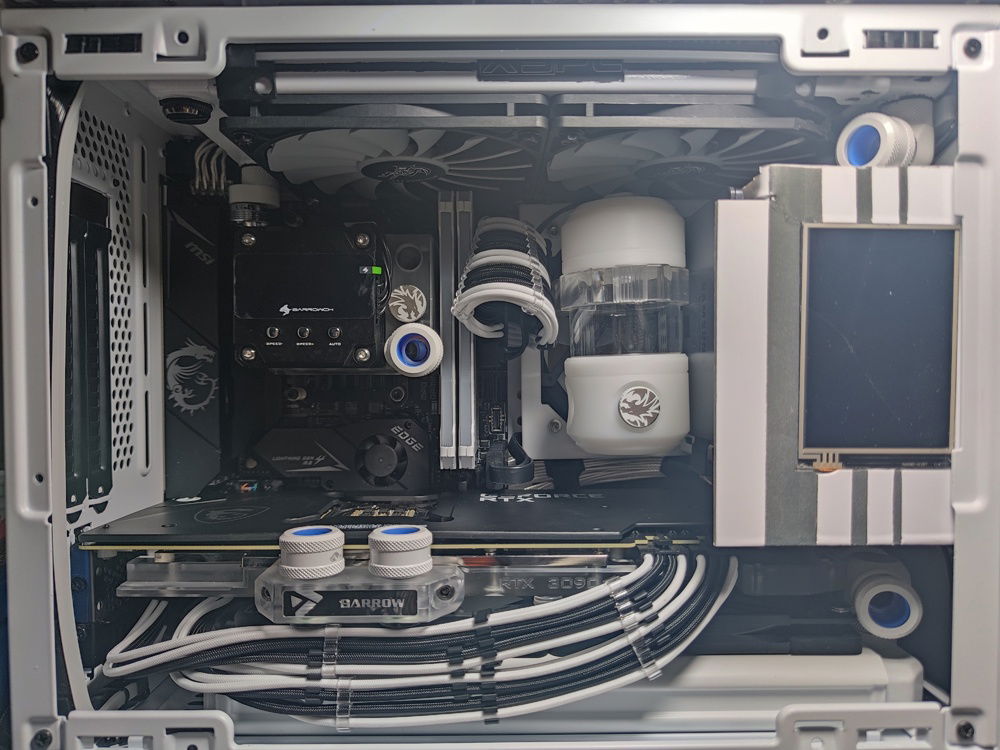 A pause after all of the setup and planning. At this point I had a general idea of where my tube runs would go, but knew enough to expect that things would change because of clearance, bending, or fitting issues. 

I was also waiting for one final component (the 92mm radiator) at this point.