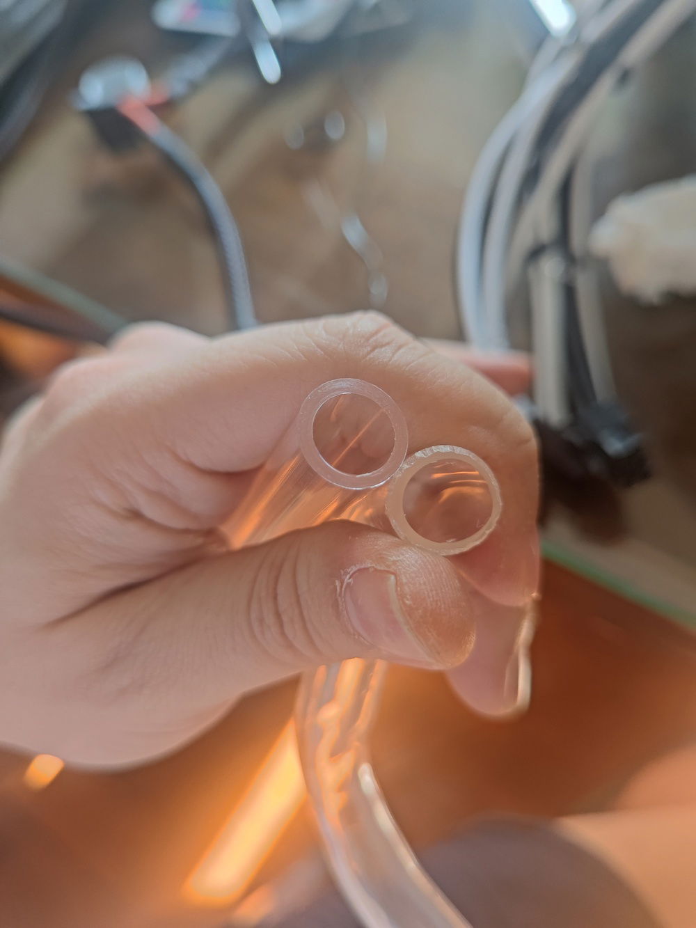 Coming back to the leak, I discovered I had over heated the tube to the point that water was getting past the compression fitting rubber because it was no longer round.

I dreaded re-bending this most complex tube in the build, but it turned out ok after the experience I gained during the process.