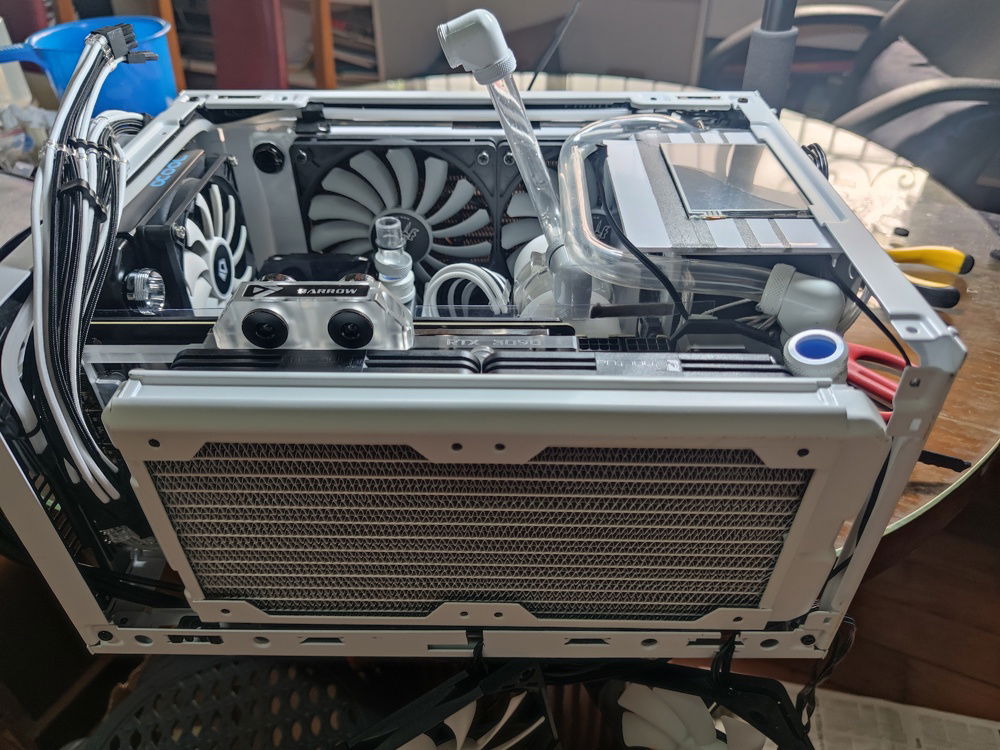 Putting things back together was easier with all of the cables out of the way and the external fans wired in and standing by.