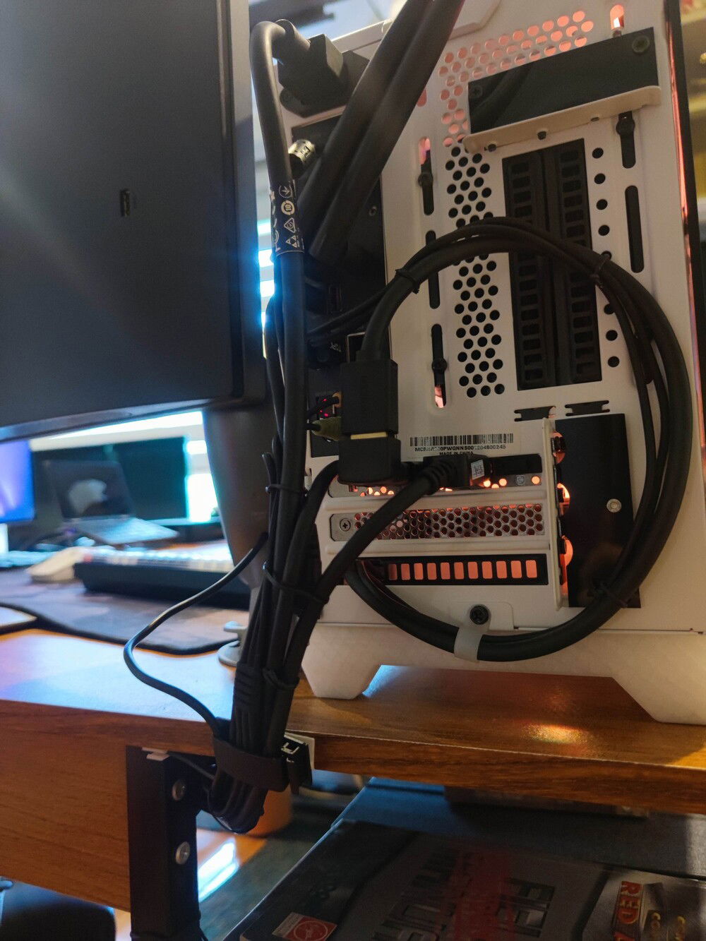 Cable management at the PC's rear. Loop is for the internal LCD.