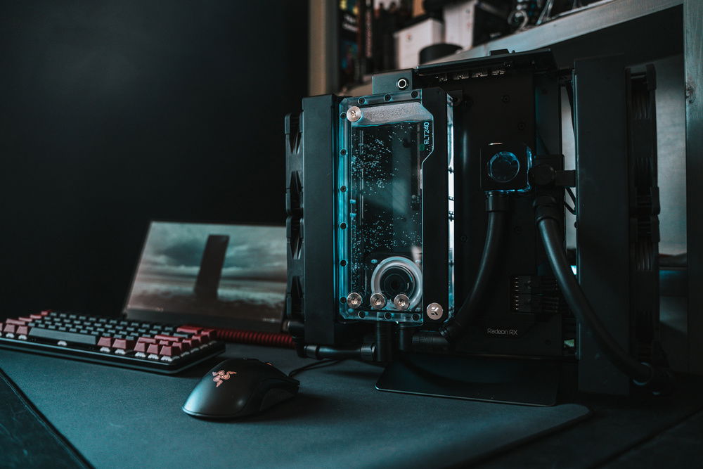 GPU side with analog flow indicator and flat D5 Pump/Res Combo attached to AIO bracket with EKWB rad bracket