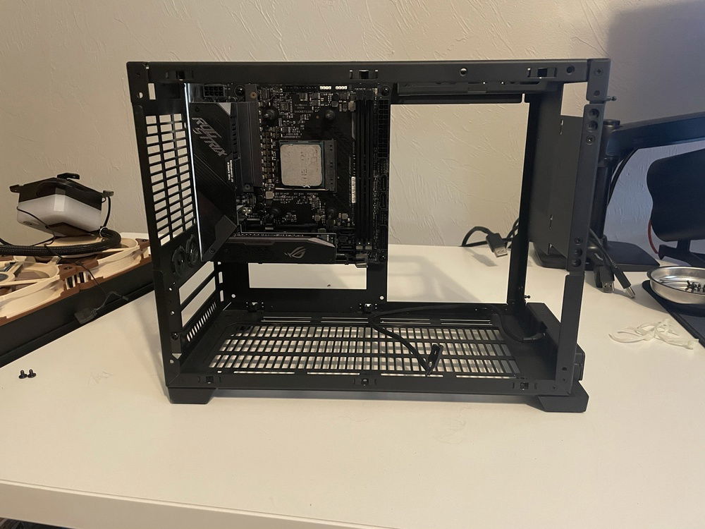 Motherboard back in after a quick dusting.