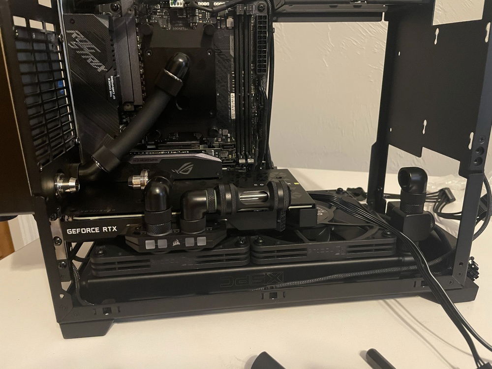 Installed the XSPC inline filter right after the GPU as it fit nicely and makes it easy to pop the side off and see if anything is going on in the loop.