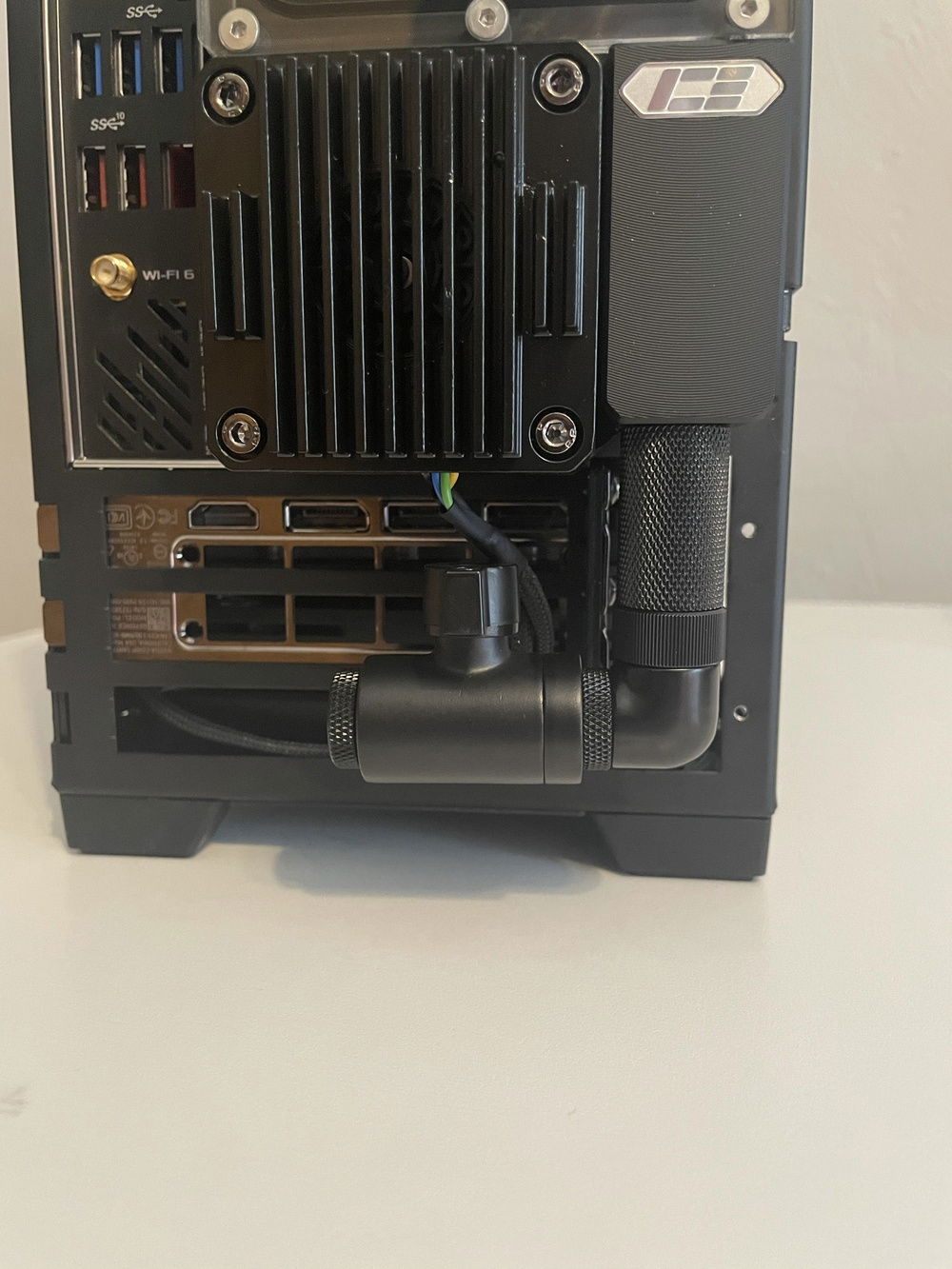 Added a drain port to the bottom of the Iceman for future maintenance. Was originally going to use a 45 degree fitting and not the long extender but I ended up running out, so this will do. Swivels behind when not needed and can swivel out when I need to drain.