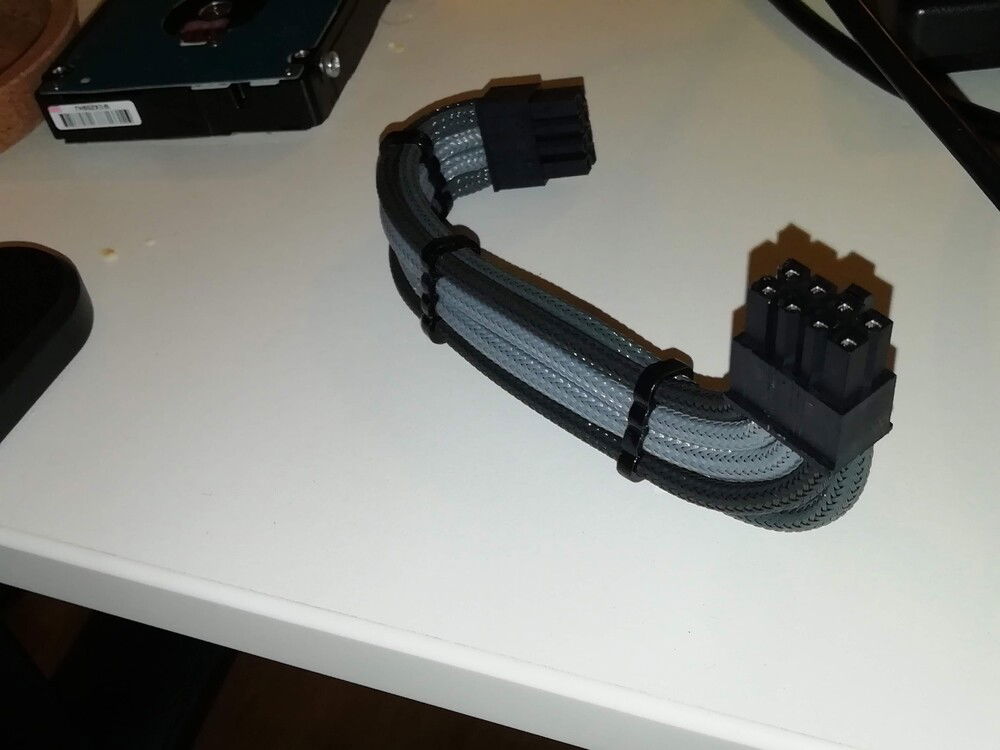 My custom made CPU power cable. Not perfect, but I guess it's not bad for being my first go at this.