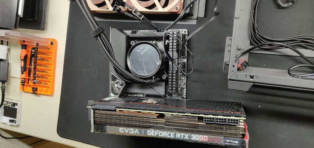 MSI Z490I Unify with EVGA RTX 3090 FTW3 Ultra. Quite the size difference.