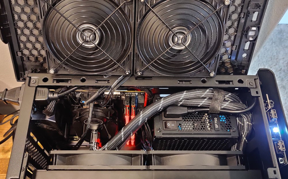 Top Panel off - showing hose routing up around PSU and down to Radiator