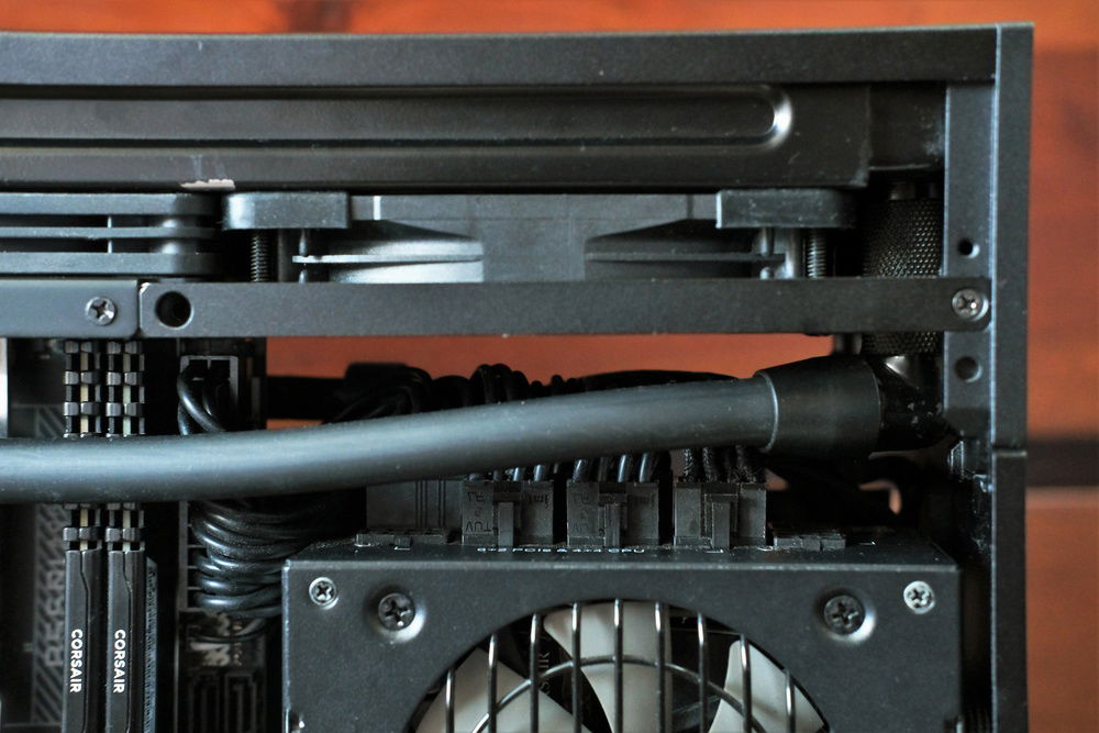 Cable management above SF750, neat and tidy to allow for as much breathing room for the fans as I could.