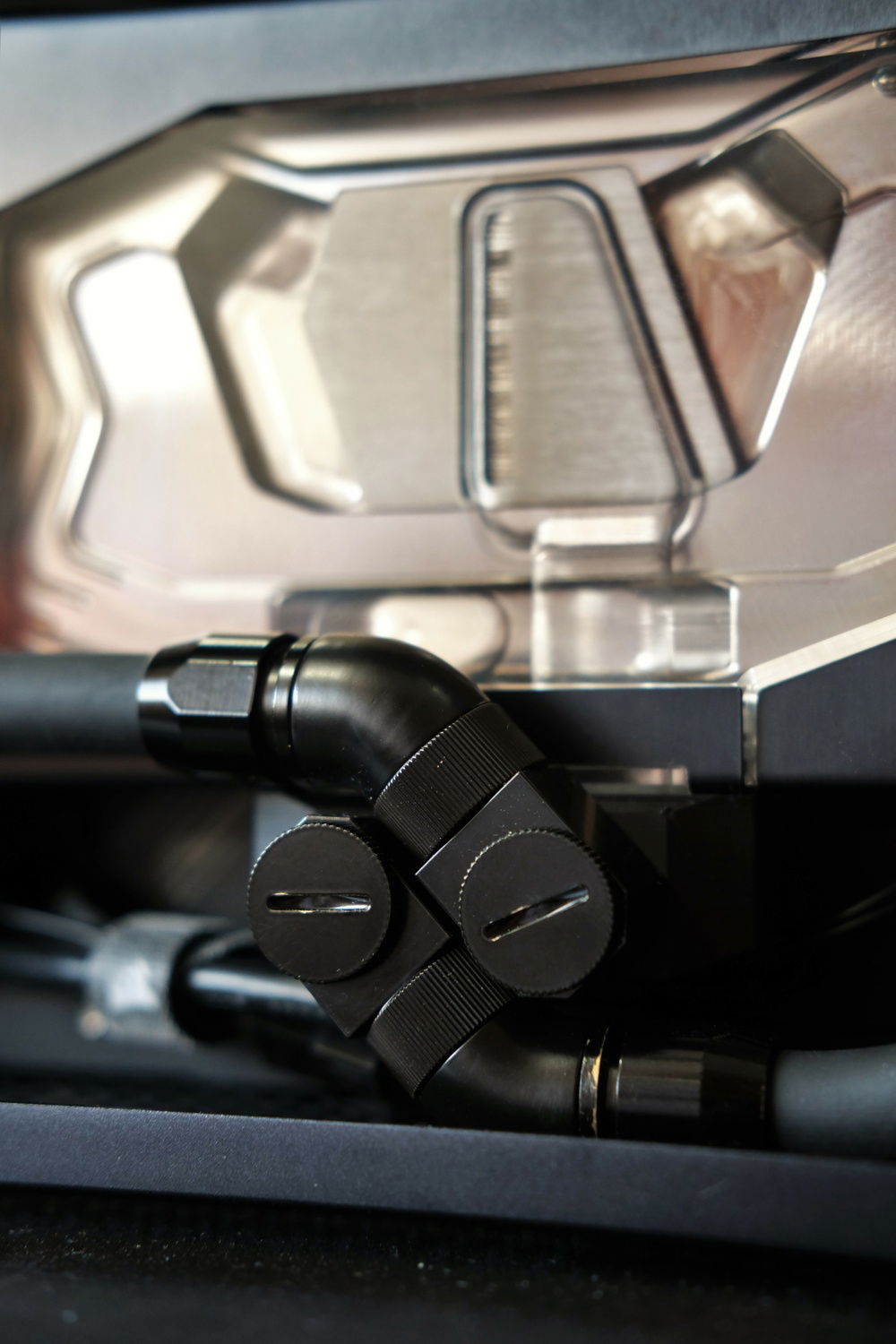 In order to close the side panels, Koolance low profile elbows were used. In order to get the correct flow path, I had to use 45 degree EK fittings to do so. I dub this the 69 combo.