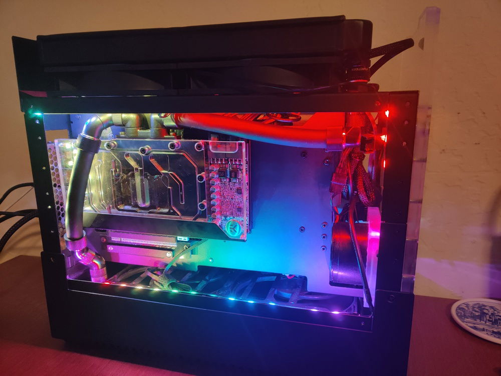 Here is the GPU side with the RGB set to Unicorn Puke. Hadn't installed Aquasuite at this point. Almost silly how small the RTX 3090 Reference board is (215mm long).