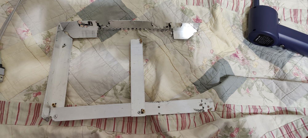 The (almost, at the time) finished aluminum base bracket. I don't have the tools needed to do a clean job nor the foresight to know exactly how much metal I actually needed lol....