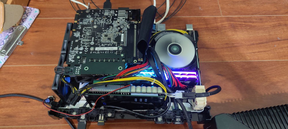 First boot. Ended up finding that the riser cable was too long and made closing the case impossible so I bought a shorter one.