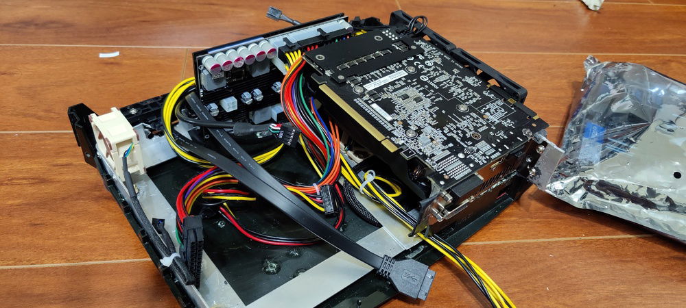 Had issues with GPU fitment, so putting it in without the mobo made it easier to find what parts of the case still needed trimming.