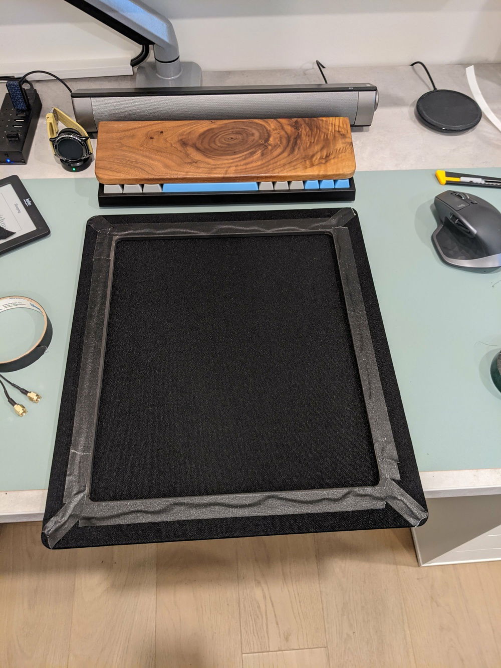 Used double-sided tape and black masking tape to hold the fabric mesh to the frame, may try and staple it down later if I can get the proper sized upholstery staples.