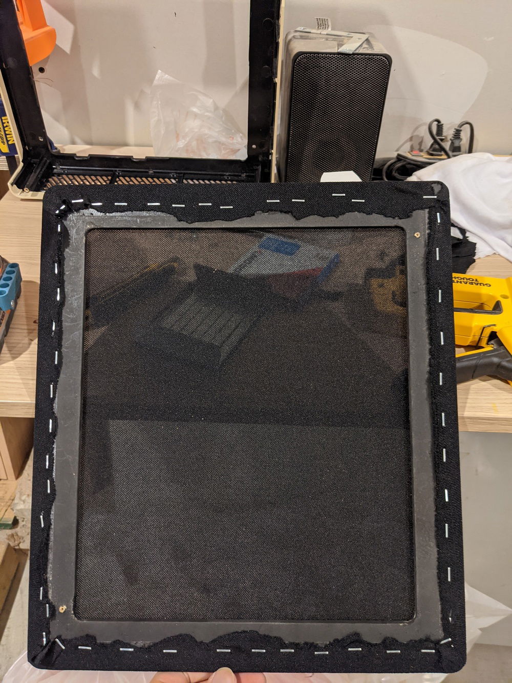 Glue on the tape melted as the pc heated up, so going with old fashioned staples for the "upholstery"