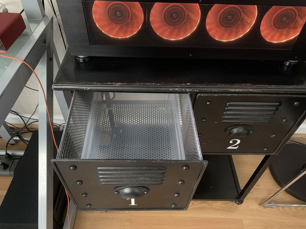 Tub lined drawer holds 2x loop capacity in case of a leak