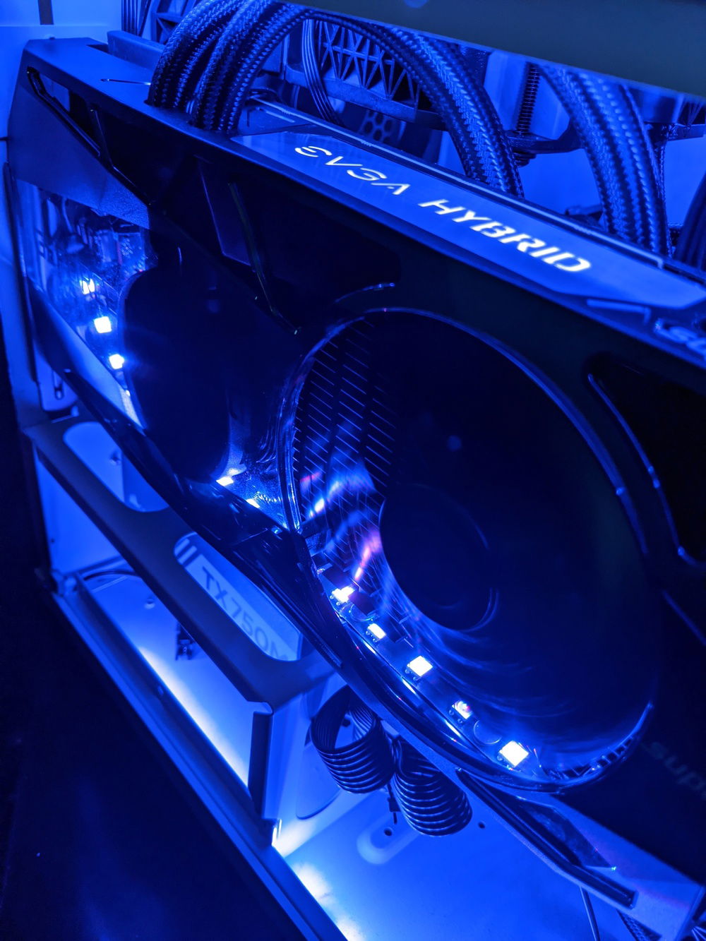 Here you can see the RGB Strip I put inside the GPU cooling shroud. I snuck the connecting wire out the same opening in the shroud as the PCI-E power.