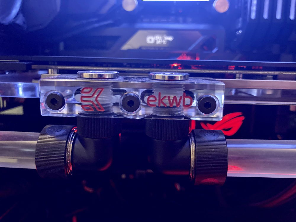 painted  the ekwb logo with red model paint.
To make it match the build and stand out more.