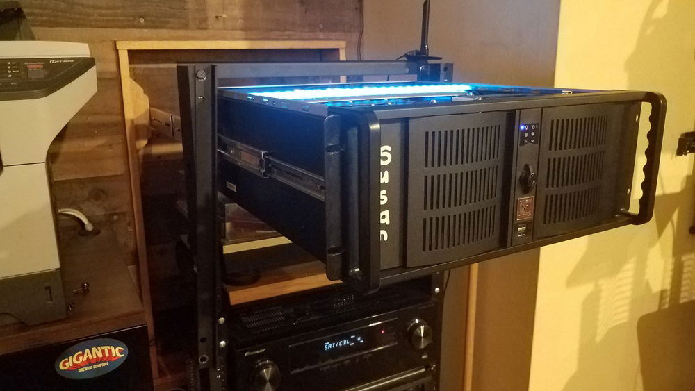 To remove Susan's lid the top front support rail of the rack needs to be moved out of the way; you can see it hanging down the left side.