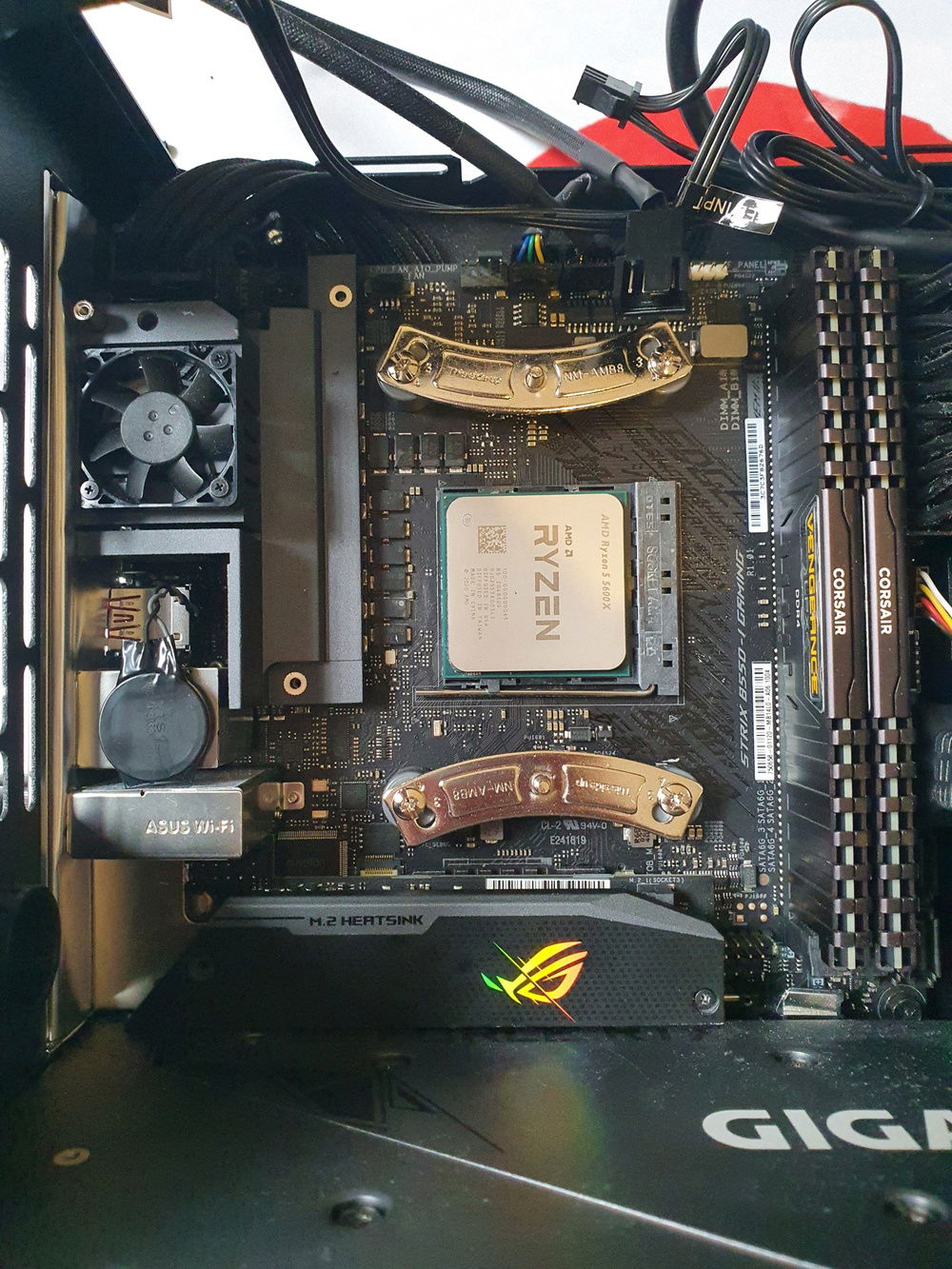 Tried to mount a 92mm fan at the rear but had to deshroud the VRM.