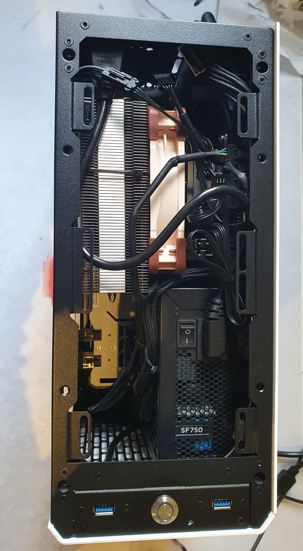 An oversized cooler makes for a good compartment to hide cables at the top