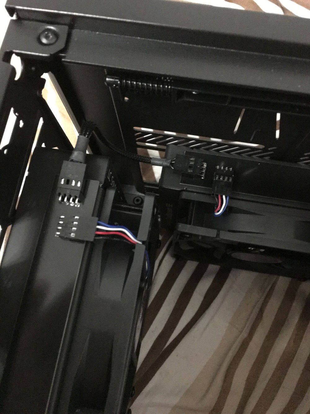 The PCBs can be connected, so only one cable to the motherboard is needed in total.