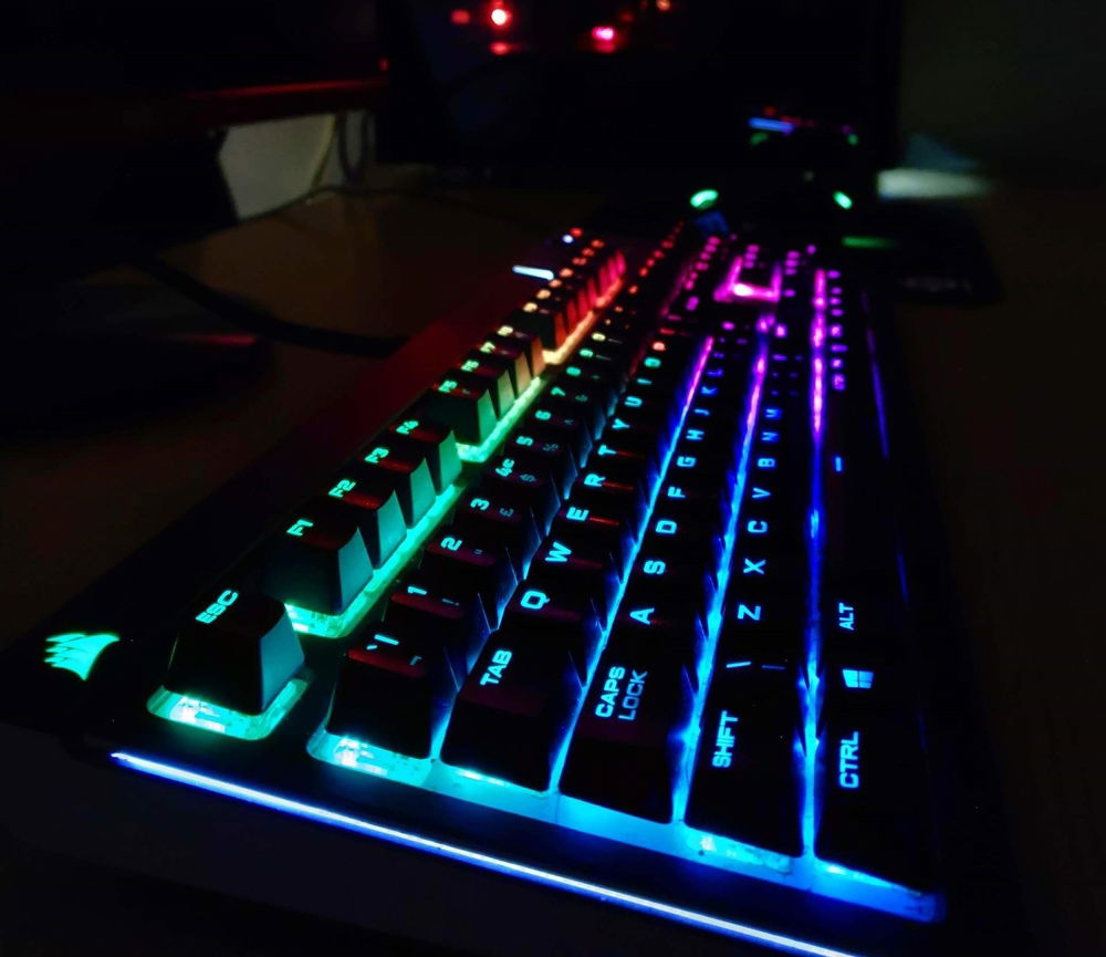 My night-time setup is handled from a Corsair Strafe RGB with the Cherry MX silent switches. Looks great and is probably the quietest mechanical keyboard of its type. Furthermore, I added o-rings to further dampen the sound, which allows me to work and game all night long, without waking anybody up, which is quite important when you often work through the night.