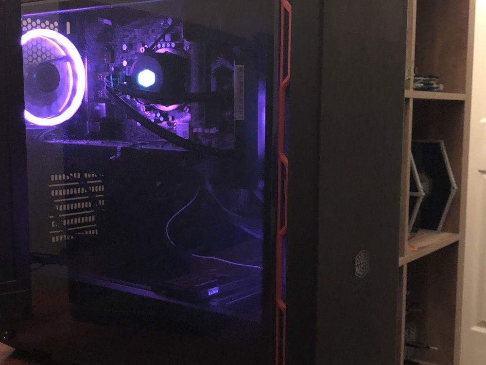 This shows my whole computer and my LEGO Tie Fighter in the background. Sorry for the bad quality.