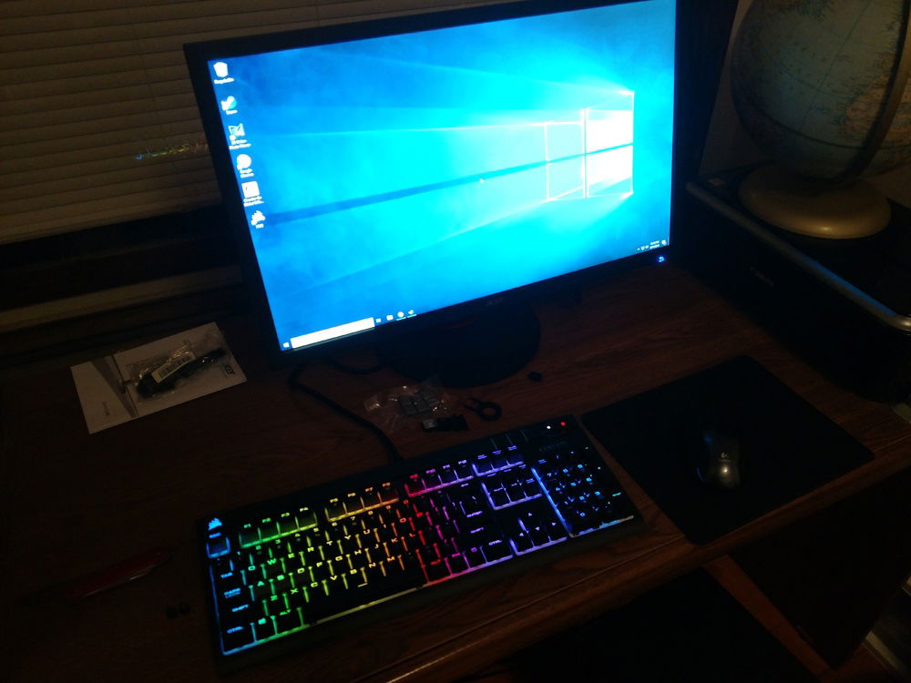 Monitor and keyboard showing windows installation complete.