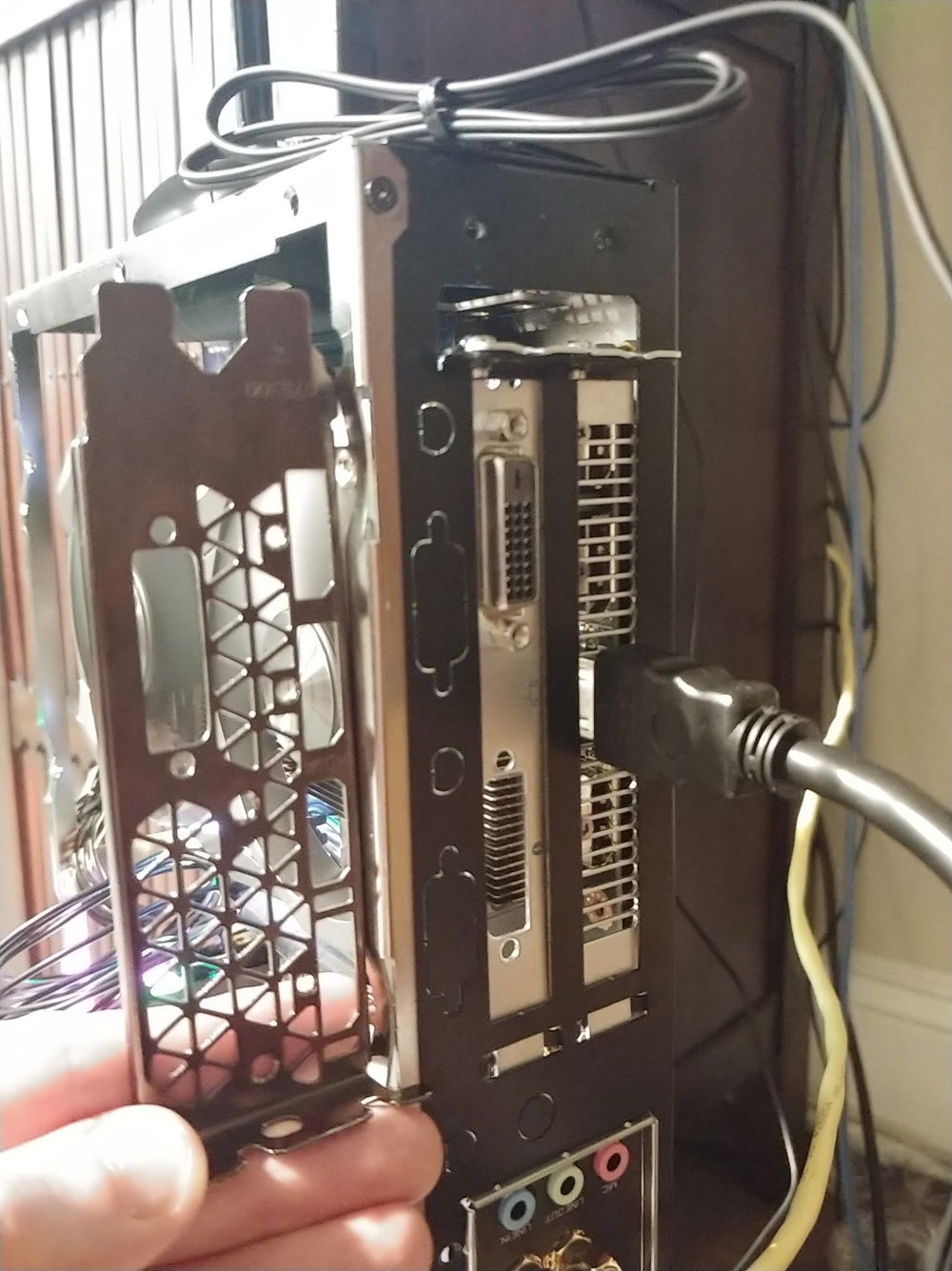 Replaced GPU I/O  shield with a generic one off eBay to mount the card reversed.