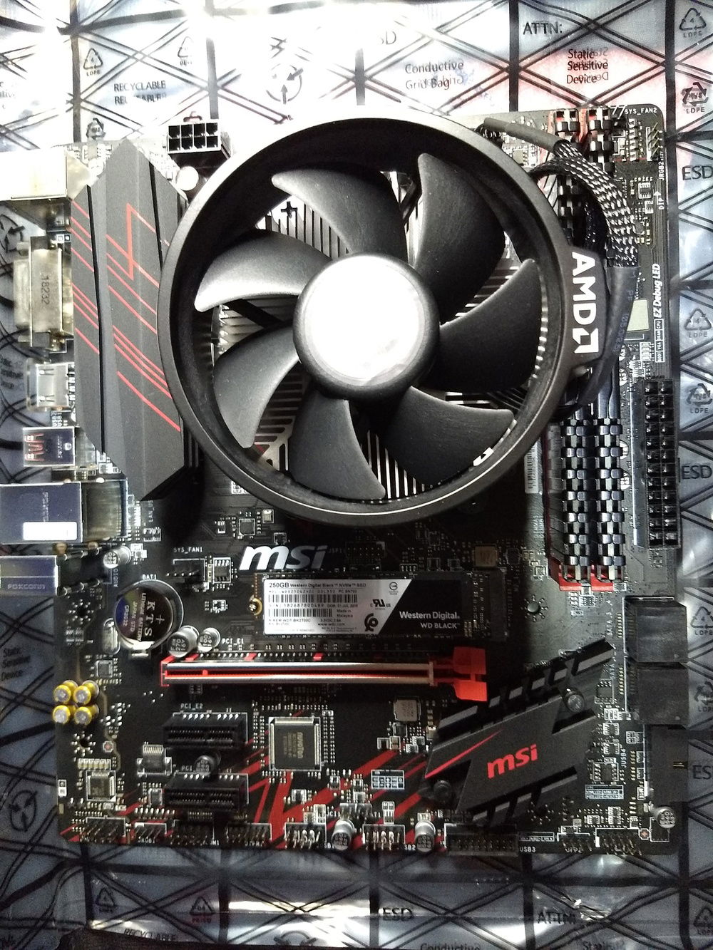 Installed CPU, CPU Fan, RAM, and M.2 drive.