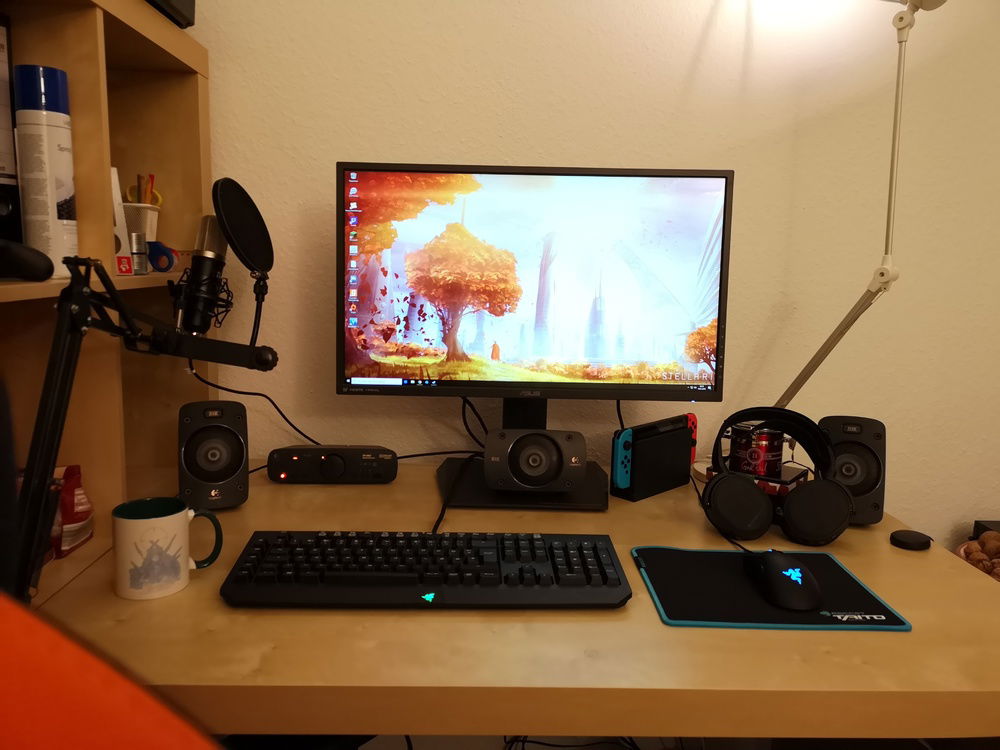 My desk. Note the tasty liqourice prominently hidden behind my headset.