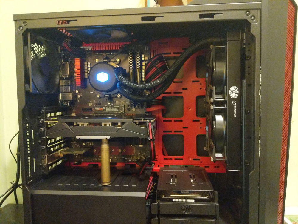 Older pic when I had a RX480 and used a .50bmg shell as a GPU support
