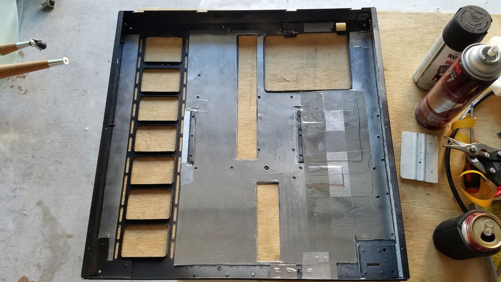 Filled in the back with aluminum sheets and some strong spray adhesive, and maybe a little bit of tape.