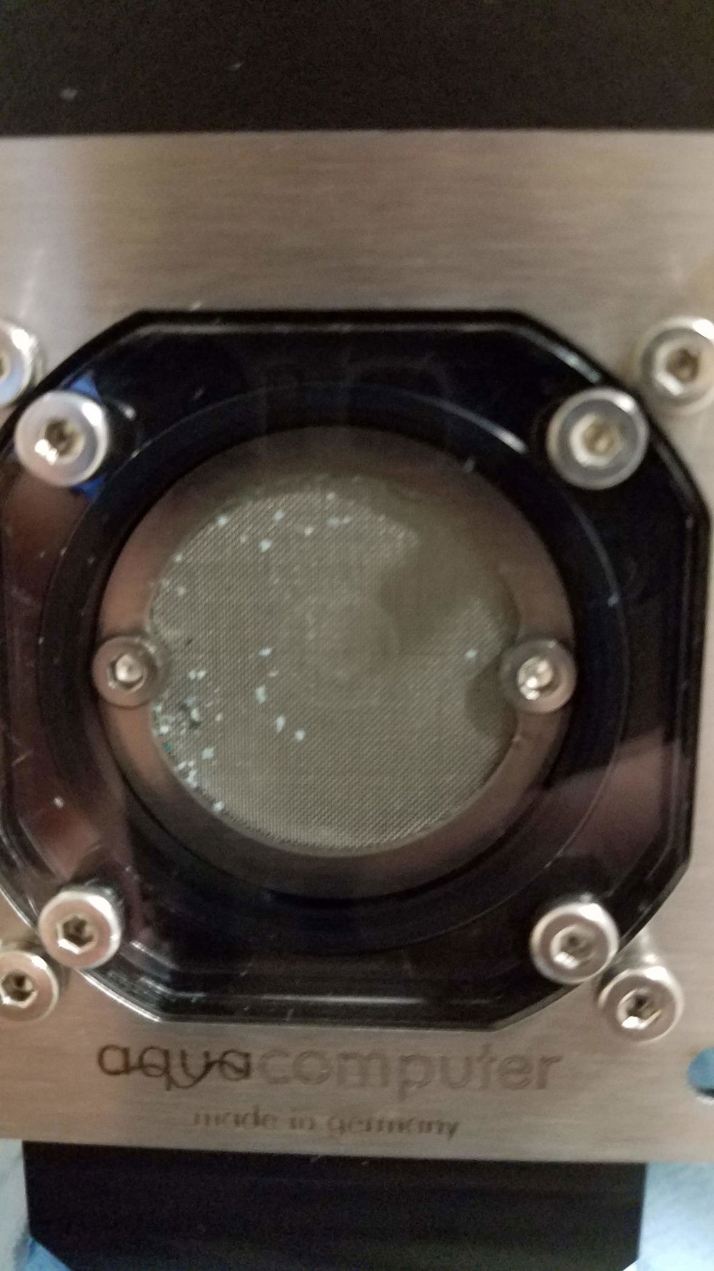 It's nice to see the filter doing its job. Don't want that stuff clogging up my blocks. Plus this filter makes it easy to clean out. Once you've removed the 4 cover screws, crack any valve behind it open just a tiny bit to relieve suction pressure, and have a paper towel handy.
