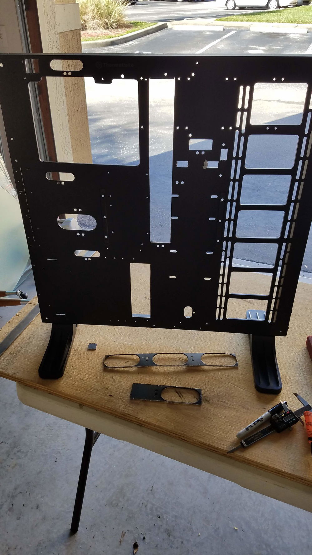 I cut out the oval grommets. They didnt work for where I wanted the wires to go onto the motherboard.