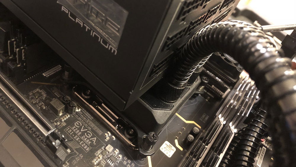 1mm of clearance between the fittings and the power supply.