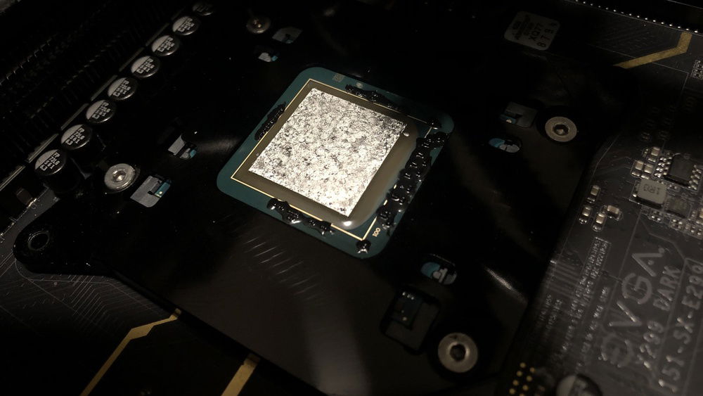 Der8auer’s Direct Die Frame, with galium applied to the CPU die.