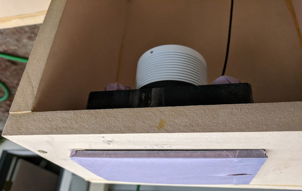 Example of how the reservoir will sit in the case.  I had to painstakingly measure the length of my fill port to get this hole positioned correctly vertically.