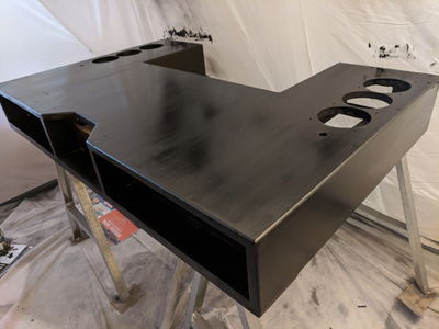 Painting...  I didn't like how the spray gloss black looked at all, so after a few coats I gave up on it and hand-painted it matte black.