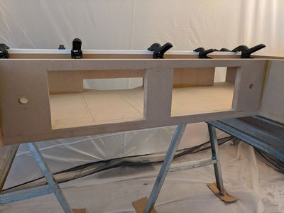 This was originally supposed to have 4 120mm fans as intakes, but with the thickness of that top piece I did not feel comfortable having it span almost 2' of distance unsupported, so I left a center pillar and now the desk can have one 120mm intake on each side with a couple inches of additional filtered passive intake.